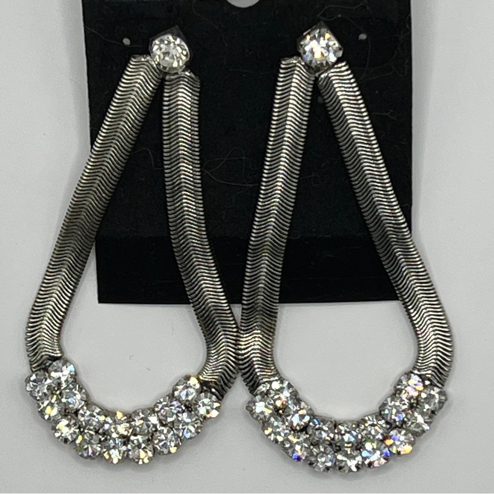 Big silver rhinestone herringbone loop earrings